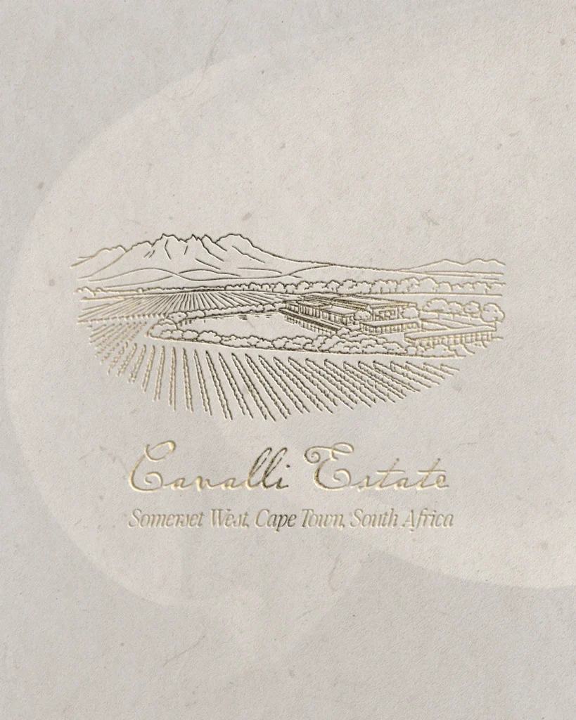 Gold-foil wine estate illustration from a wedding stationery suite