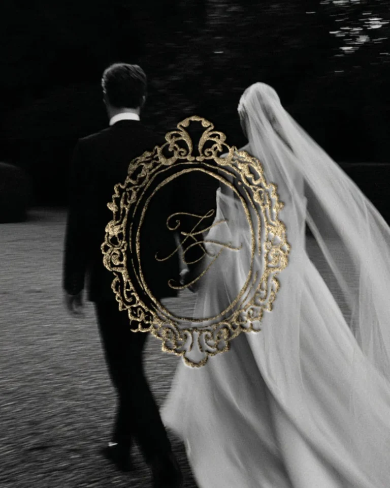 Gold-framed wedding monogram over a black-and-white photo of the bride and groom